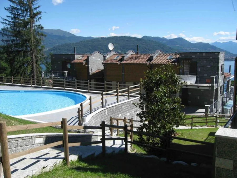 The 149 square metre shared swimming pool at Lakeside Harmonies, looking out over Lake Maggiore