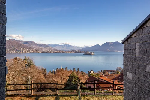 View from the residence over a stone wall to Isola Bella and the far shore of the lake