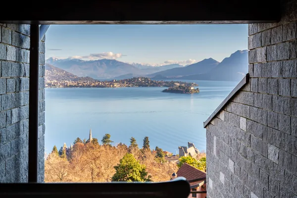 Isola Bella and the lake framed between the residence's stone walls